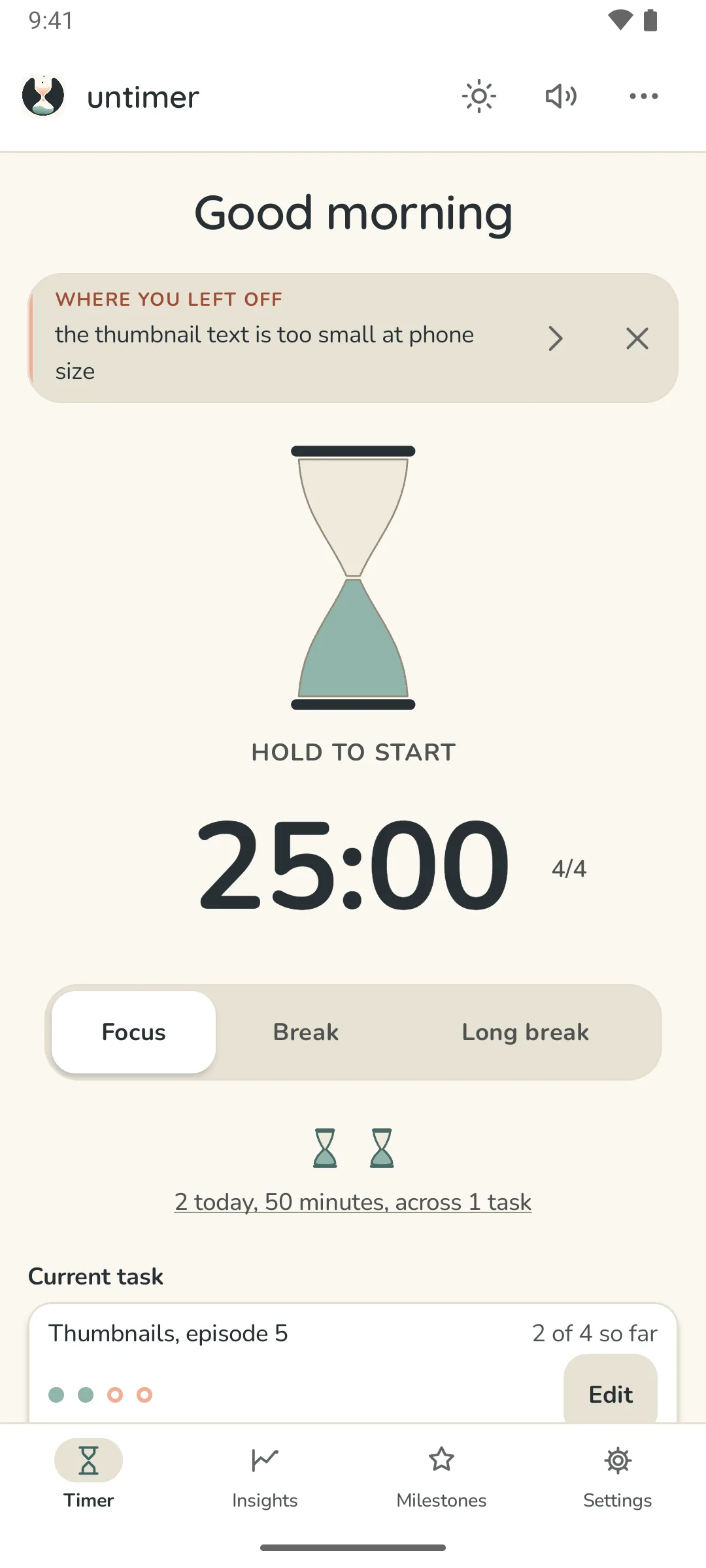 Untimer for Android at rest, in paper light: Good morning at the top, the message box with a line written at the last interruption, the hourglass at rest with Hold to start under it, 25:00 with the set figure, the Focus, Break and Long break selector, two small hourglasses for today's sessions, and the current task at two of four.