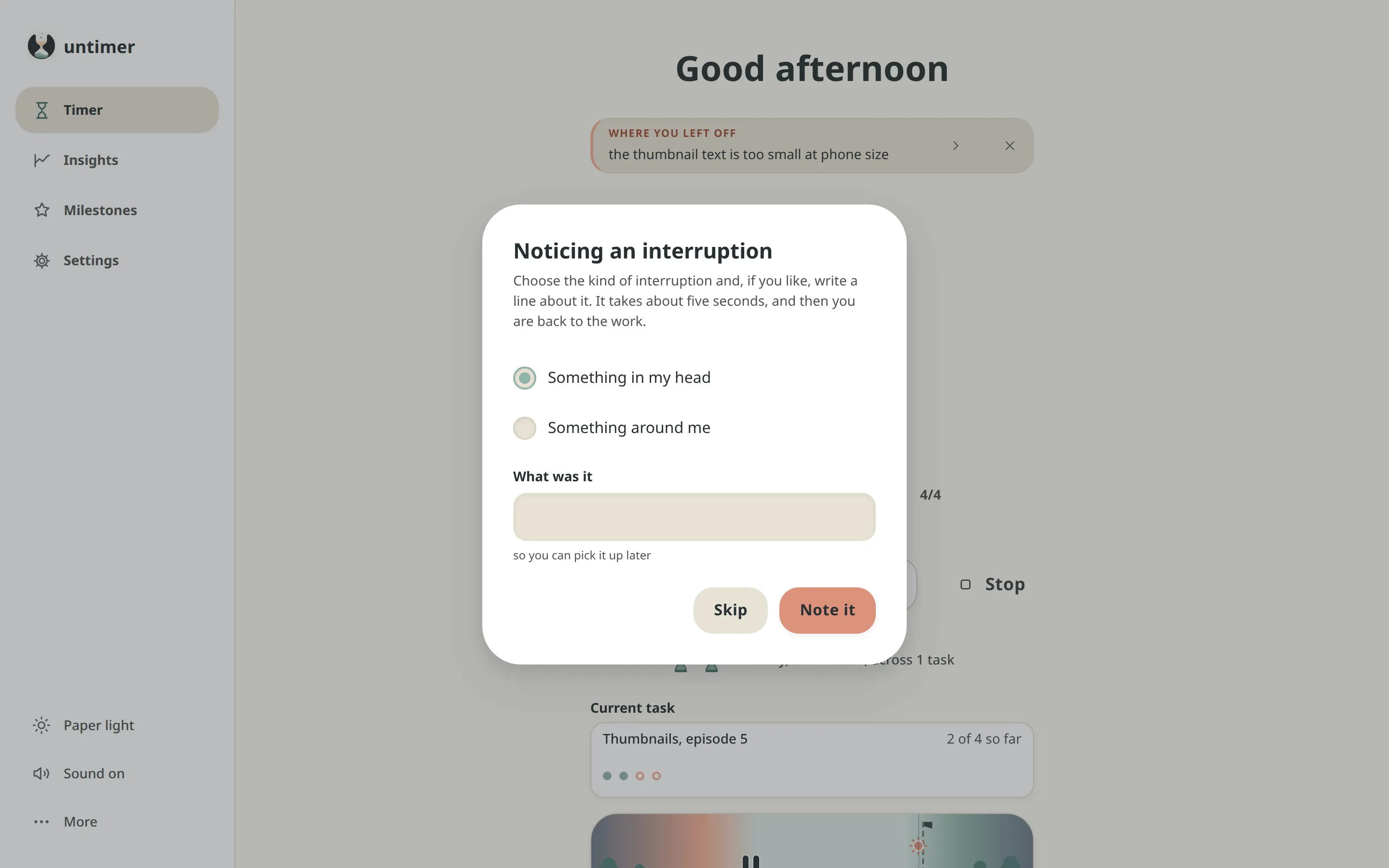 The interruption sheet over a running session. It offers Something in my head and Something around me. Below them are a field for one line and the buttons Skip and Note it.