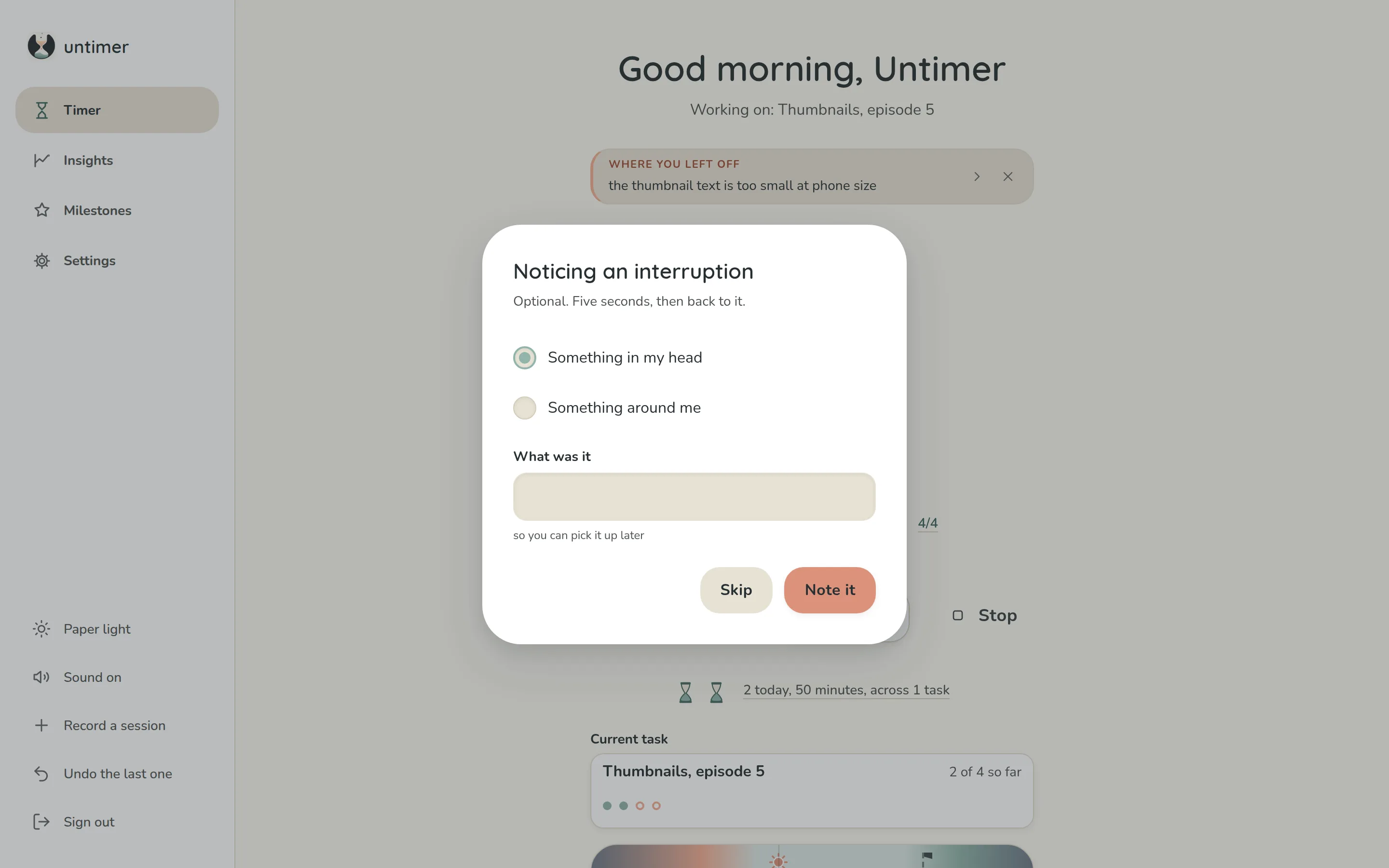 The interruption sheet over a running session: Noticing an interruption, optional, five seconds, then back to it; two choices, Something in my head and Something around me; a field labelled What was it, so you can pick it up later; and two buttons, Skip and Note it.
