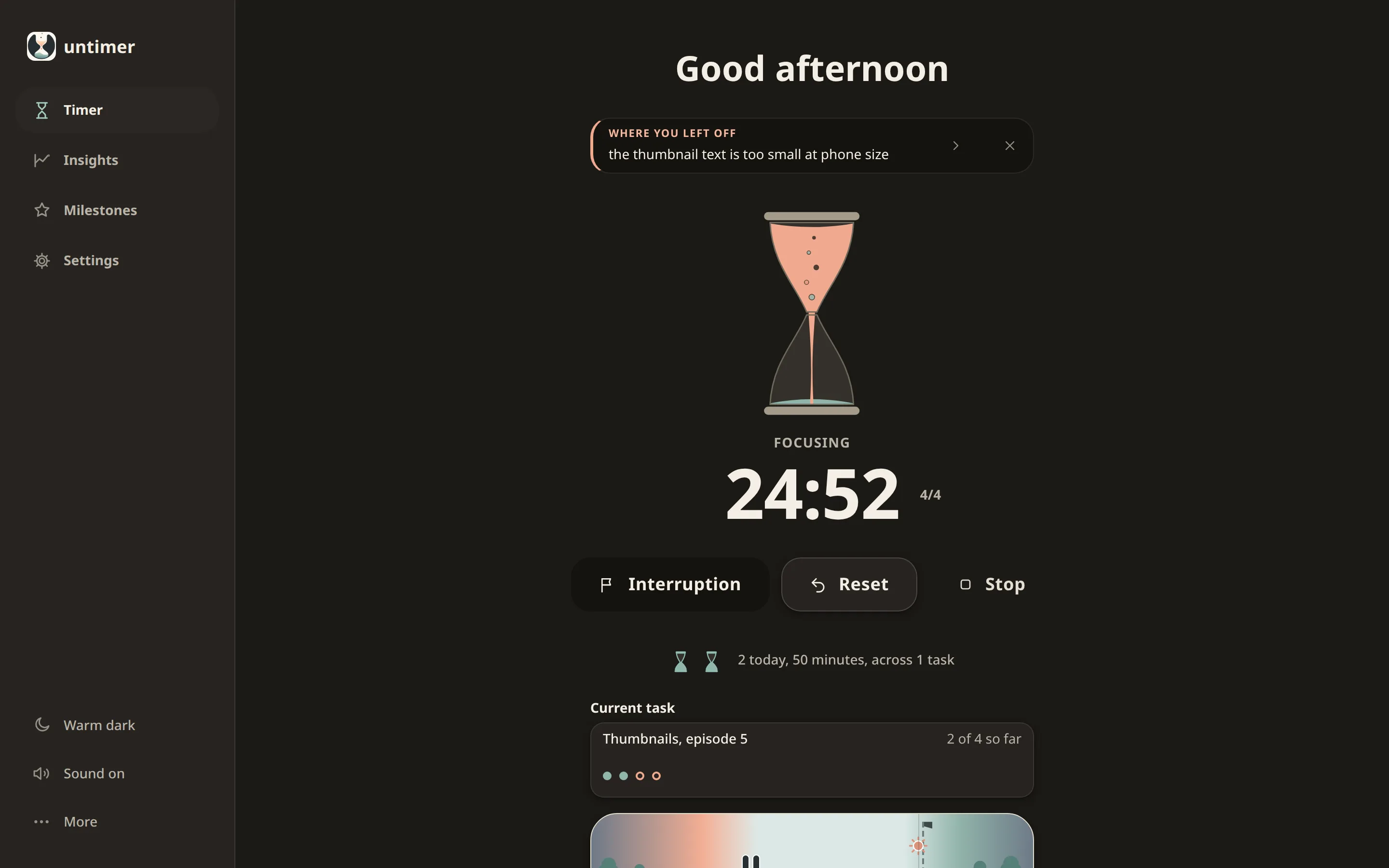 The Timer screen in the warm dark theme while a session runs: the hourglass full of peach sand pouring into sage, Focusing under it, 24:52 beside the set figure, and the three controls Interruption, Reset and Stop.