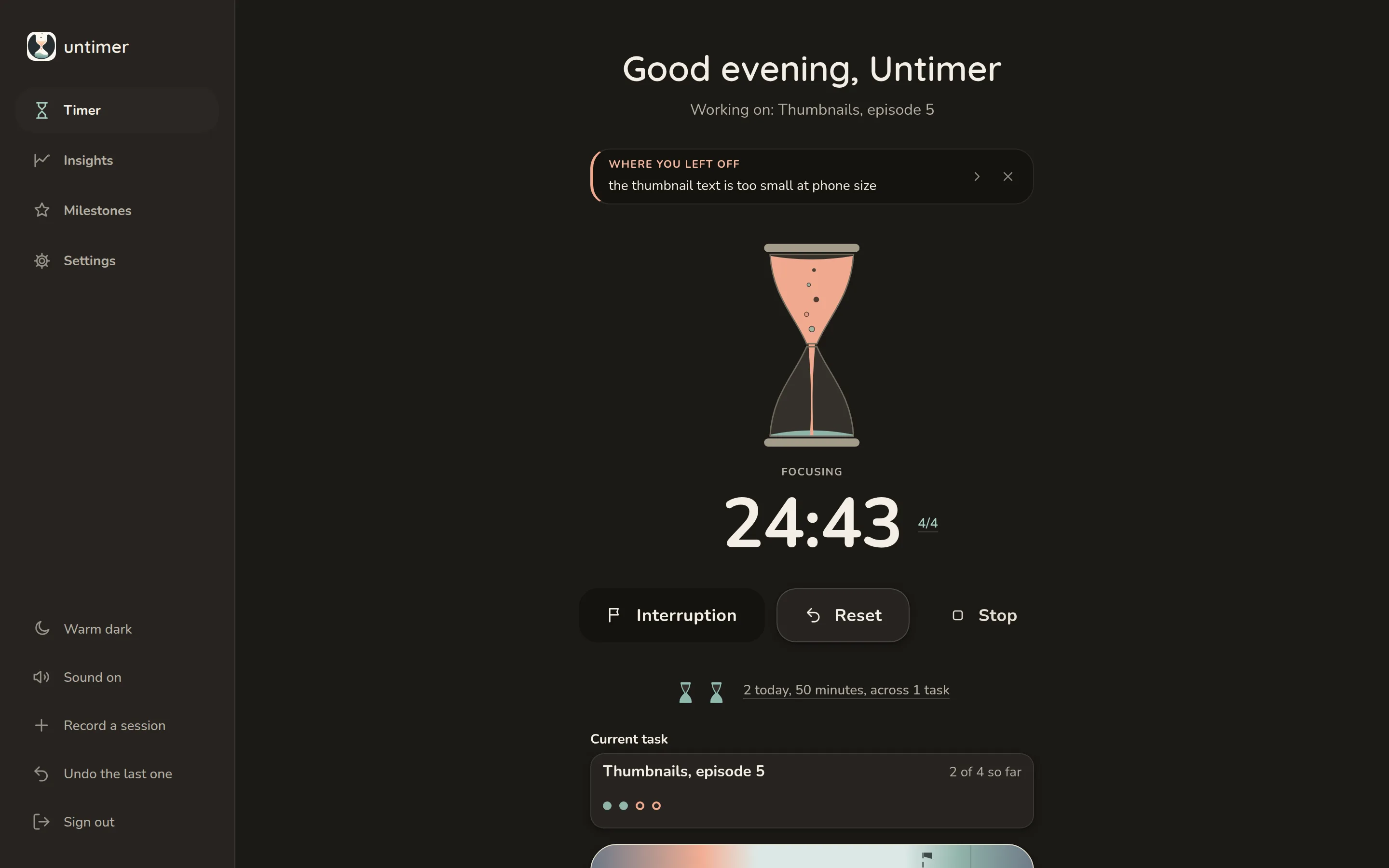 The Timer screen in the warm dark theme while a session runs: the glass full of peach sand pouring into sage, Focusing under it, 24:43 beside the set figure, and the three controls Interruption, Reset and Stop.
